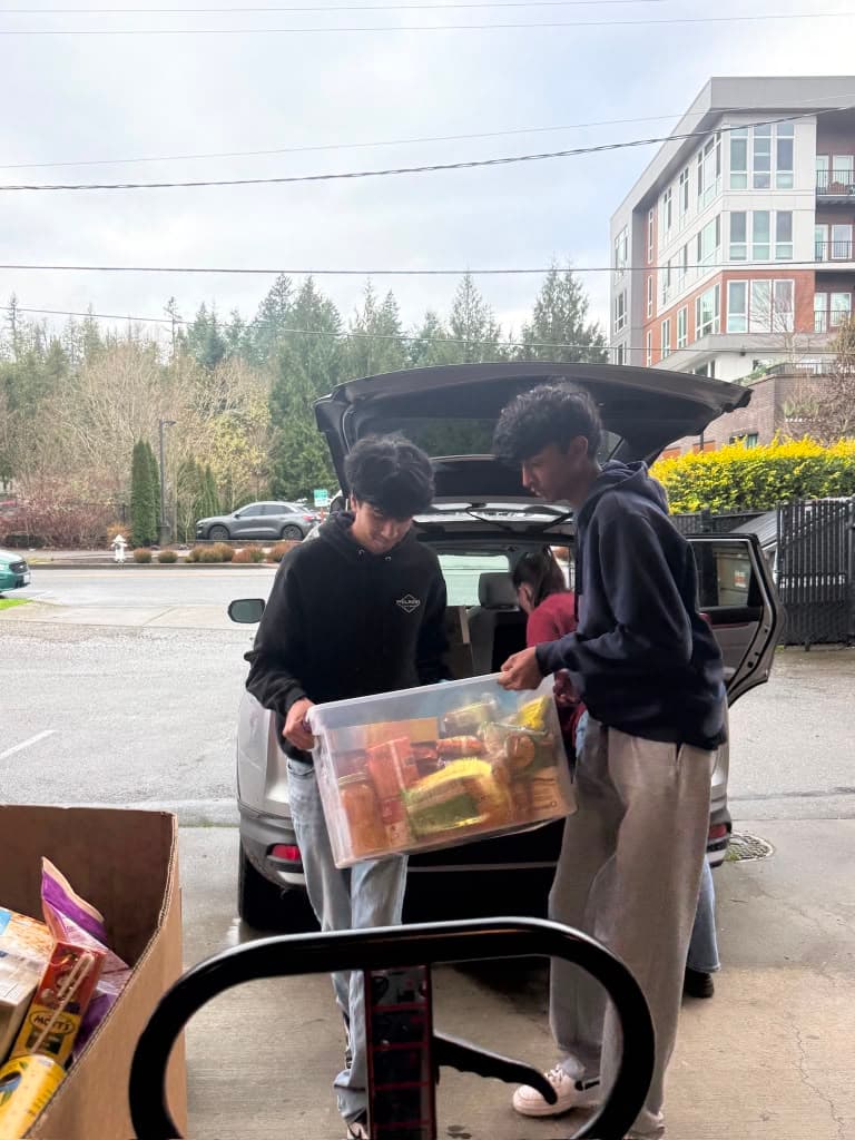 Unloading food boxes at the food bank loading dock