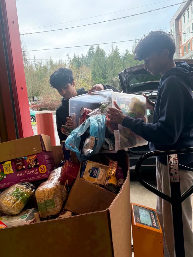 Carrying food donations from the car